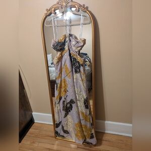 Elegant Gold and Black Framed Maxi Dress